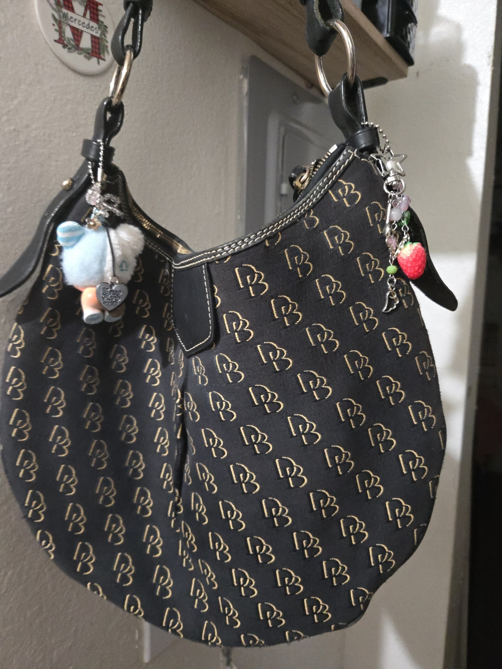 Dooney & Bourke Black and Gold Logo Hobo Shoulder Bag